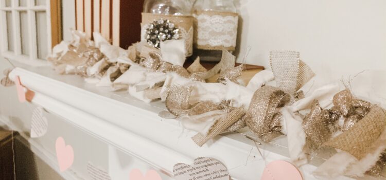 DIY paper heart garland with book pages and pink card stock