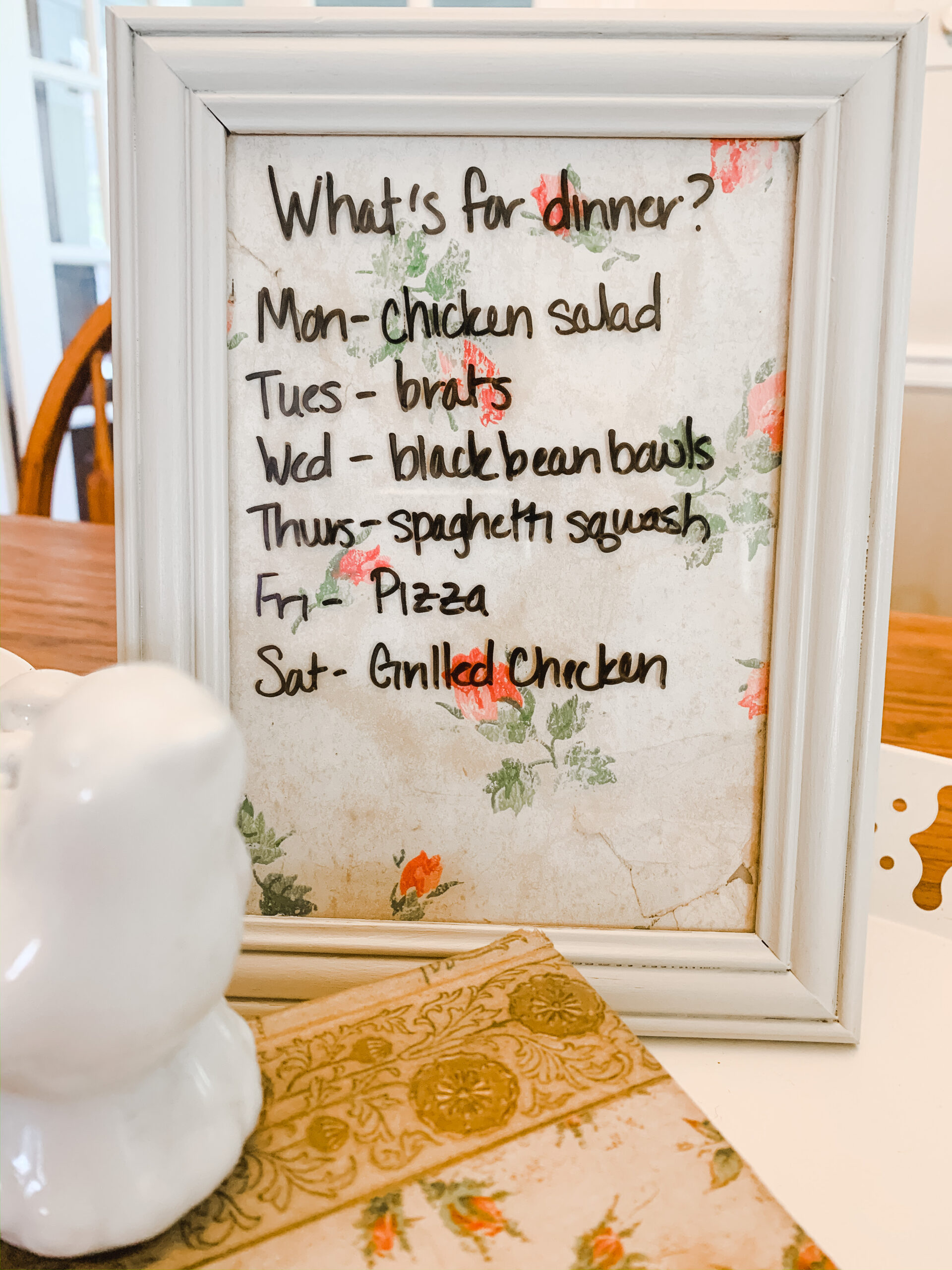 DIY dinner menu out of framed antique wallpaper