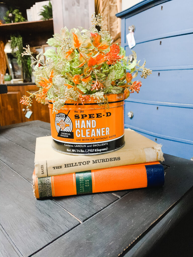 Vintage books with florals and vintage tin