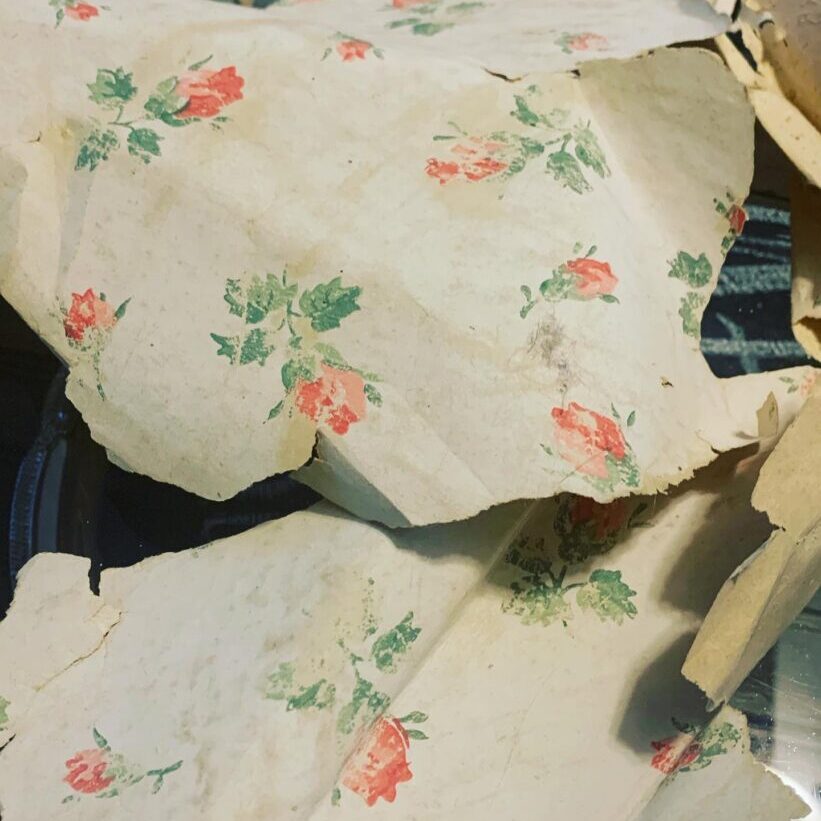 antique wallpaper scraps with rosebuds