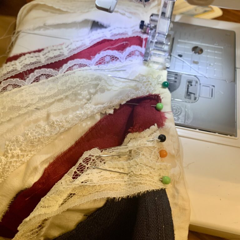 Sewing the lace and scrap flag