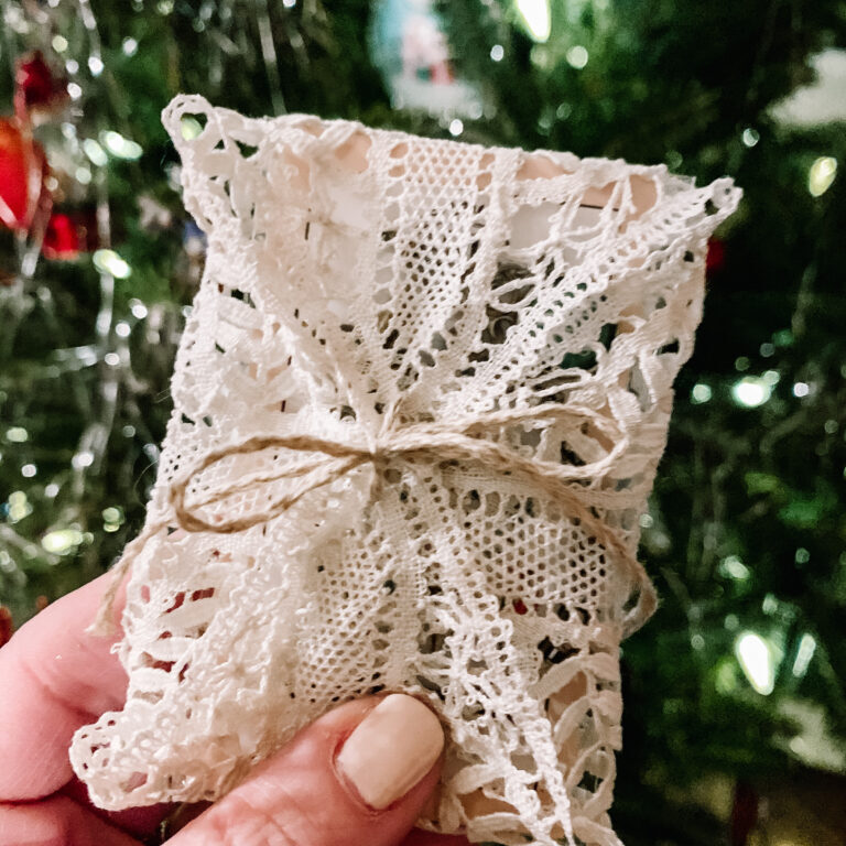Small gift wrapped in a doily
