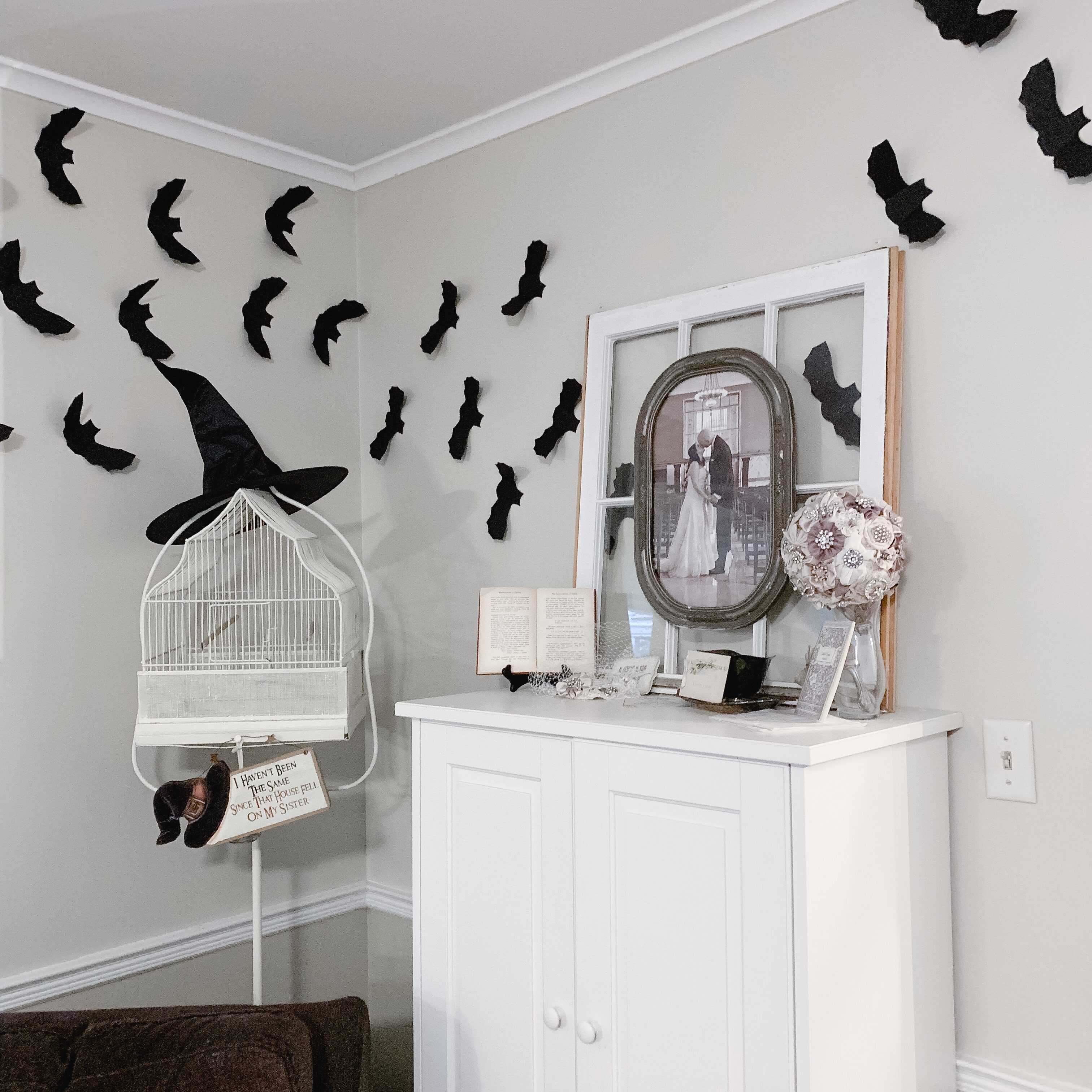 Paper bats on the living room wall