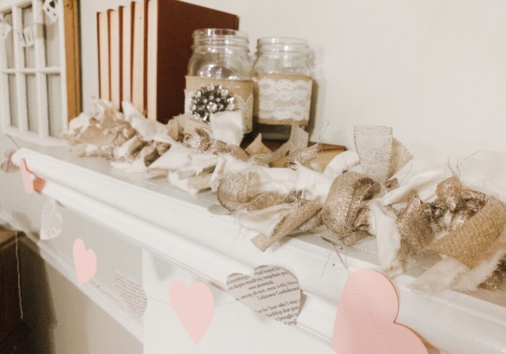 DIY paper heart garland with book pages and pink card stock